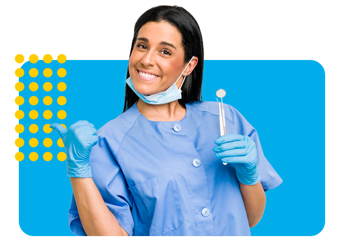 Dentist woman isolated on white background points with thumb finger away laughing and carefree