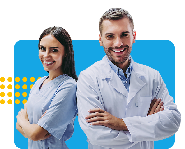 dentist and hygienist smiling