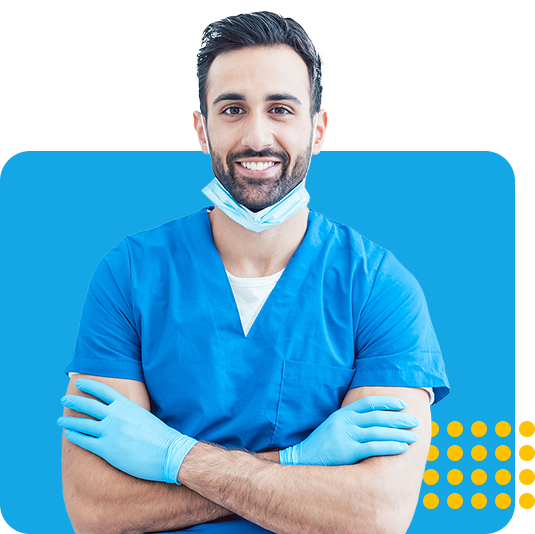 male dentist against a blue background